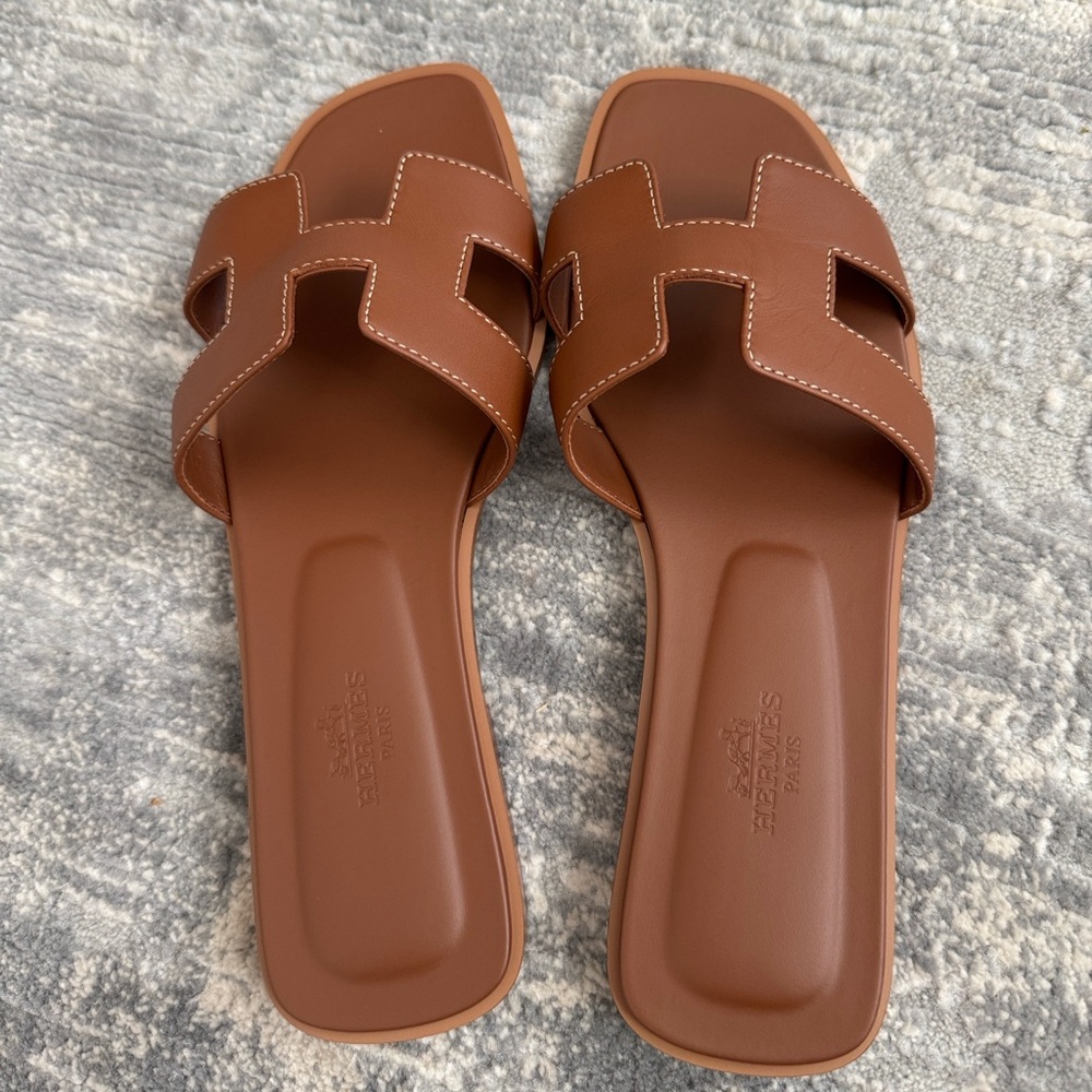 Almost new Hermes Oran Sandals. Worn ONCE. Dust bags, box and receipt included.